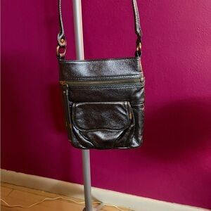 B. Makowsky Metallic  Leather Crossbody Bag in Pewter.